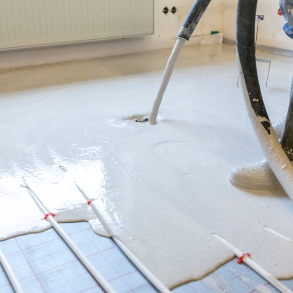 Machine,Running,Screed,Flooring.,Worker,At,A,Construction,Site,Screed